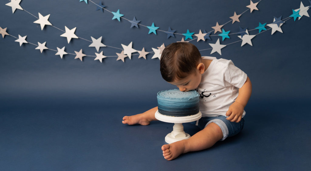 baby gift registry, cake smash chester, little boy eating beautiful blue cake
